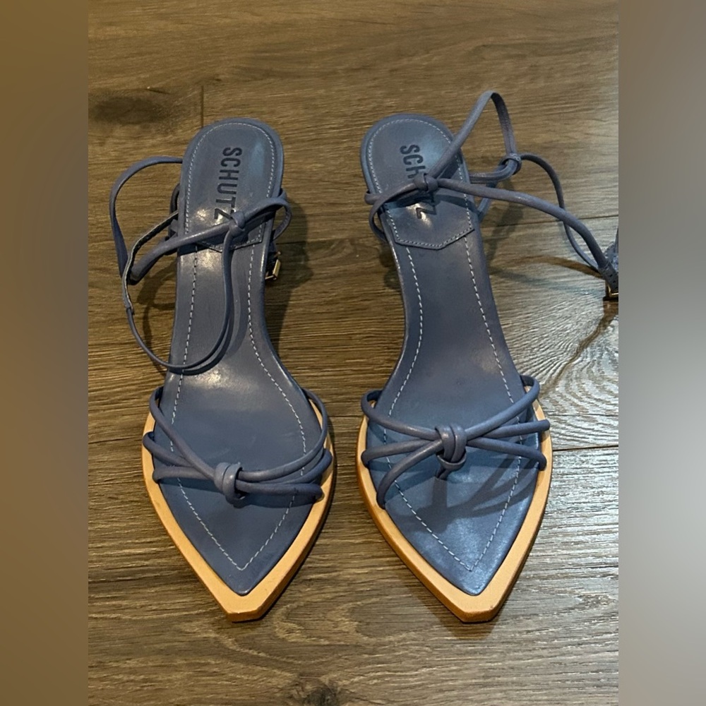 NEVER WORN!!!! Schutz blue low heeled sandals. Still have the dust bag. Size 7.